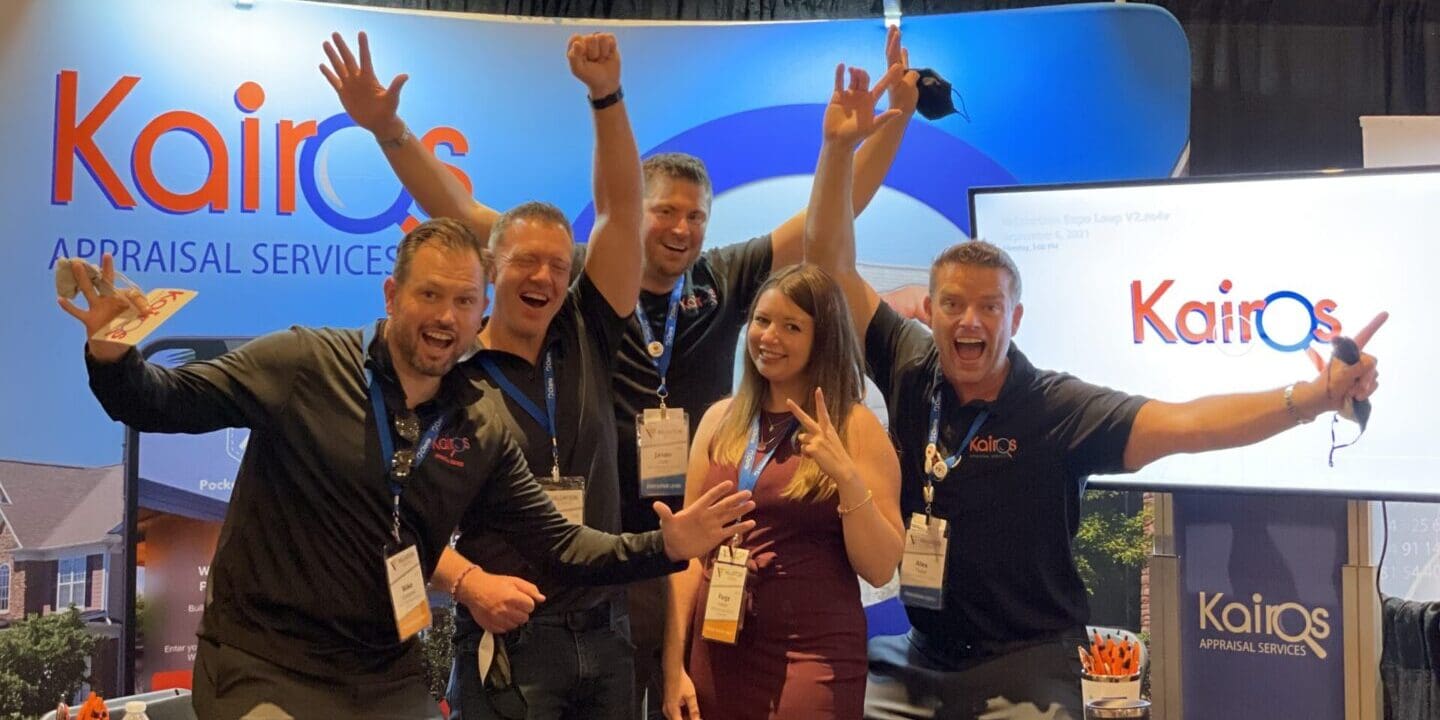 Trade show booth team celebrating at expo
